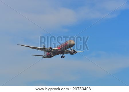 Passenger Airplane Landing At The Airport