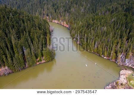 Aerial drone view of Red Lake between Hasmas Mountains in Transylvania, Romania.