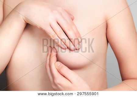 Breast Self-exam (bse). Healthcare, Medicine, Female Controlling. Young Beautiful Woman Examining He