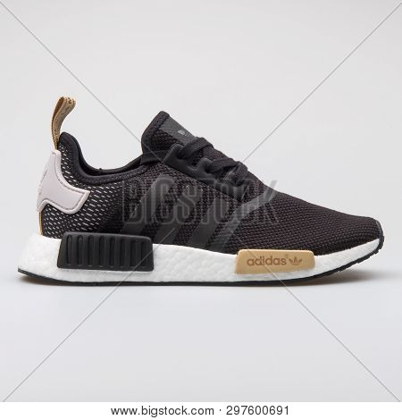 Vienna, Austria - August 7, 2017: Adidas Nmd R1 Black And White Sneaker On White Background.