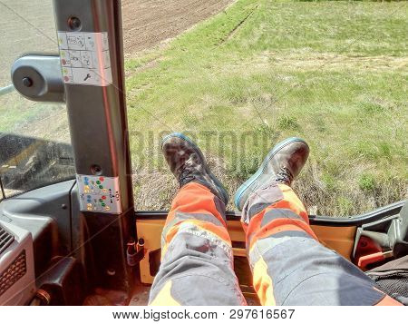 Sokobanja, Serbia - April 25, 2019: Worker Rests His Legs During The Break While Waiting To Start Ro