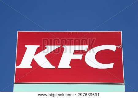 Vejle, Denmark - April 12, 2018: Kfc Logo On A Panel. Kfc Is A Fast Food Restaurant Chain That Speci