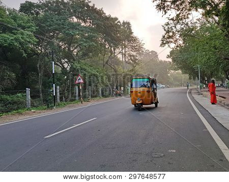 Riksha driving early morning in Tiruvanamalai India