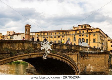 Florence, Italy - 2019. Tourists Crossing Old Medieval Bridge In Florence.