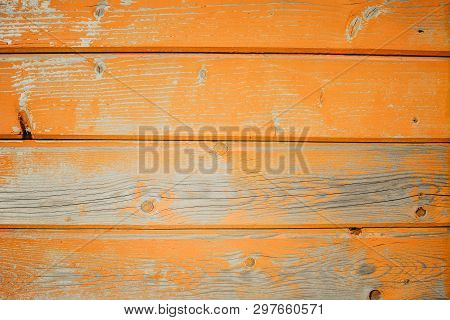 Background Of Orange Flaky Wood Backdrop Of Red Colored Wooden Panels With Aged Flaky Surface