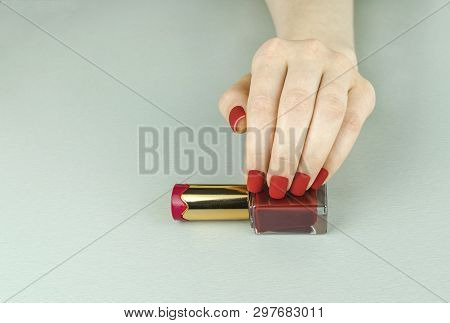 Stylish Fashionable Female Red Matte Manicure, Square Shape, On Black Background, Crocadile Skin