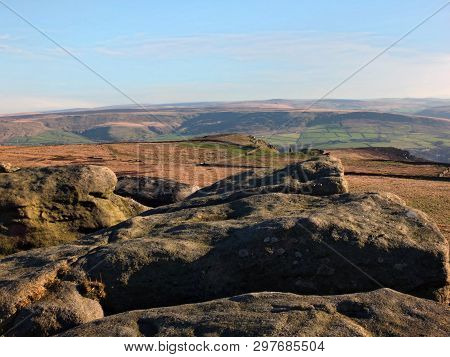 Exposed Rocks And Boulders On Bridestones Moor In West Yorkshire In Sunlight And Shadow