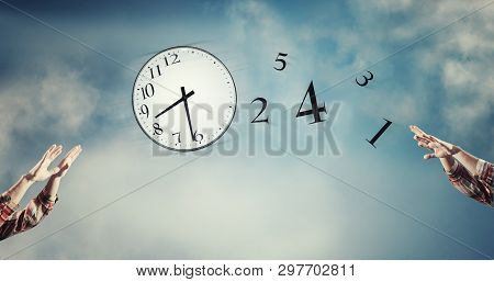 Passing A Clock With Numbers Detached In The Air. Lack Of Time Concept . The Concept Of Time Passing