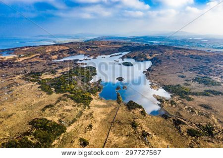 Aerial View Of Lough Doon Between Portnoo And Ardara Which Is Famous For The Medieval Fort - County 