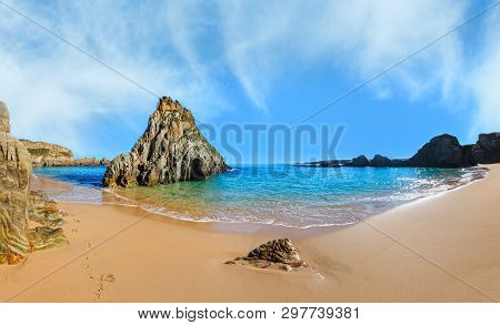 Summer Sandy Mexota Beach And Pointed Rock Near, Spain. Atlantic Ocean Coastline Landscape.