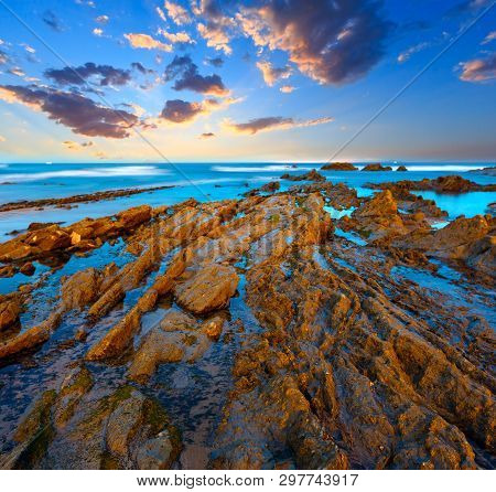 Twilight Ocean Coast With Ribbed Stratiform Rock Formations, Atlantic Ocean, Spain