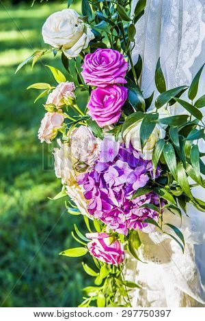 A Fragment Of Decor From White And Poy Roses And Hydrangeas