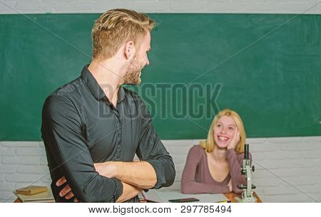 Bright Student. High School Student Saying Lesson. Male Student With Examiner At Examination. Handso