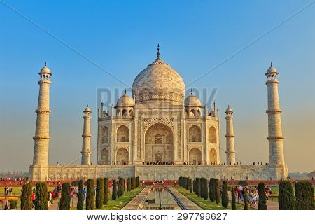 Agra, India - March 5 2018: Tourists Sighteseeing, Exploring And Admiring Famous The Taj Mahal