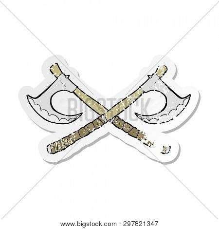 retro distressed sticker of a crossed axes