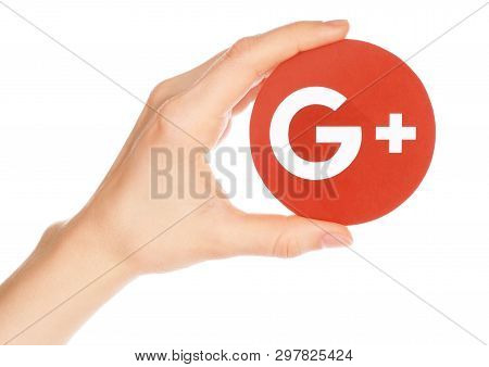 Kiev, Ukraine - February 21, 2019: Hand Holds Google Plus Icon Printed On Paper. Google Is Shutting 