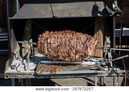 Turkish Cag Kebab On Pole In Horizontal Position
