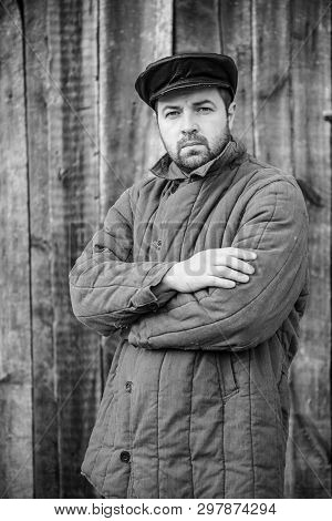 Portrait Of Old-fashioned Man, Monochrome. Concept - Peasant Of 1950S, Retro Style