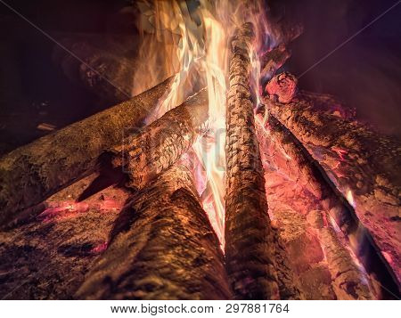 Close The Fire Flame Of Marching Fire, Super Slow Motion Of Burning Wood. Bright Bonfire With Beauti