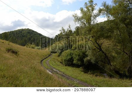 Mountain Landscape In The Vicinity Of The Taiga Settlement Of The General Of The Altai Territory In 