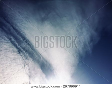 Dramatic Blue Sky With Clouds And Sun Rays