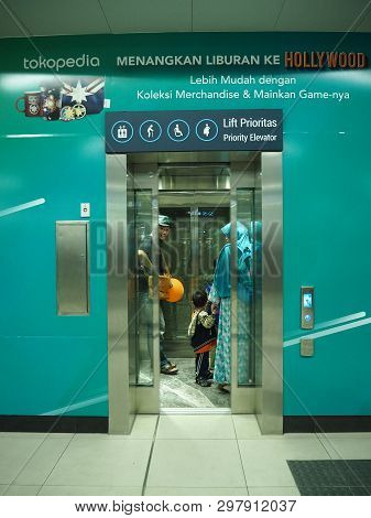 Jakarta, Indonesia - April 7, 2019: Some People Take Into The Priority Elevator At Bundaran Hi Mrt S