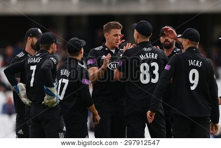 LONDON, ENGLAND. 25 APRIL 2019: Morne Morkel of Surrey celebrates taking the wicket of Dawid Malan of Middlesex  during the Surrey v Middlesex, Royal London One Day Cup match at The Kia Oval. 
