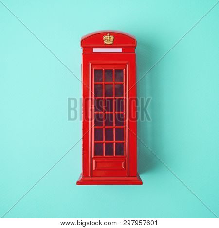 London Red Telephone Booth On Blue Background. Top View From Above