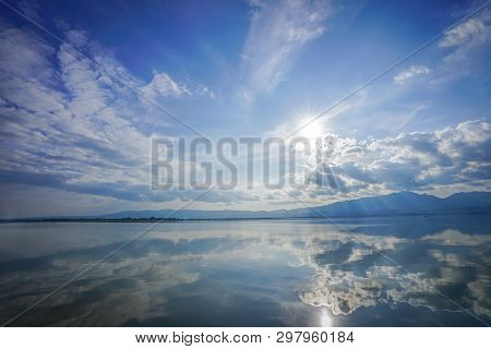 Wonderful Reflexion Mirror Between Sky, Cloud, Sunshine And Sea, Representative Like Paradise Or Hea