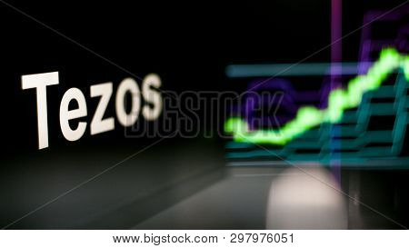 Tezos Cryptocurrency Token. Rise In Price And Growth Of Quotations, The Green Graph Up. The Behavior