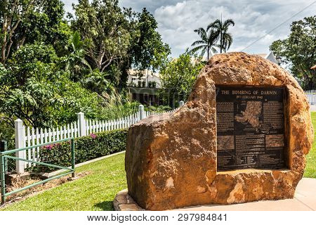 Darwin Australia - February 22, 2019: Brown Stone Statue With Plate Of The Bombing Of Darwin, Set In