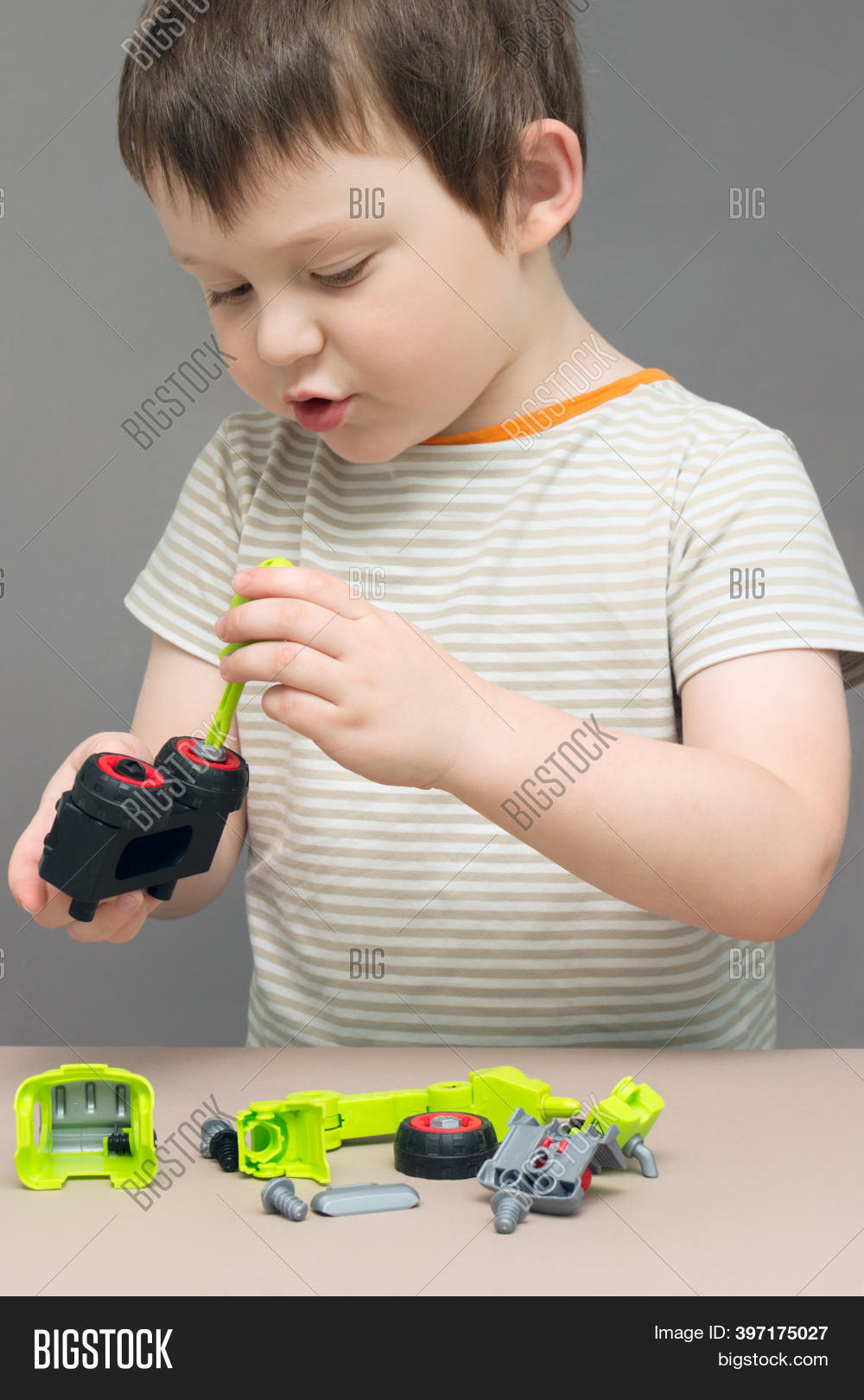 Boy Repairs Toy Image & Photo (Free Trial) Bigstock