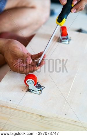 Fixing Castor Wheel To The Wooden Plywood, Furniture Making.