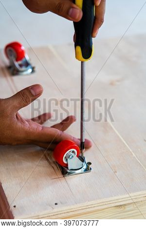 Fixing Castor Wheel To The Wooden Plywood, Furniture Making.