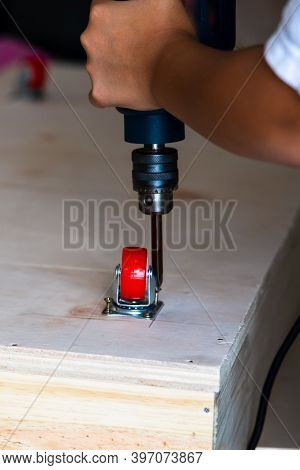 Fixing Castor Wheel To The Wooden Plywood, Furniture Making.