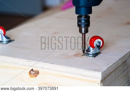 Fixing Castor Wheel To The Wooden Plywood, Furniture Making.