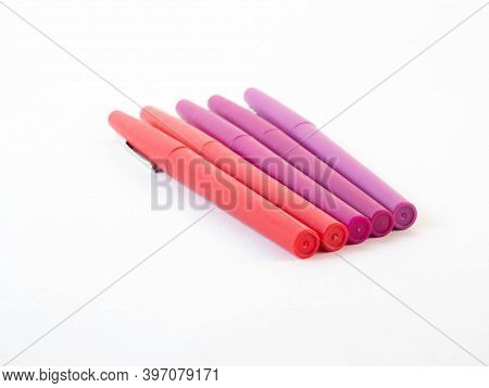 A Gradient Of Rouge With Markers. Concept Around Drawing And Creativity.