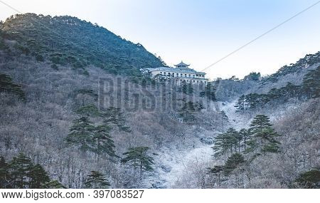 The Pine Tree And Tourist Information Building Covered Of Snow At The Winter Season At The Huangshan