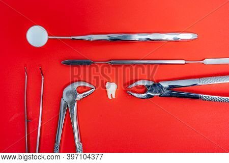 Specific Medical Dental Instruments For Examining Patient. Tooth Model. Dental Set, Mirror, Probe, W