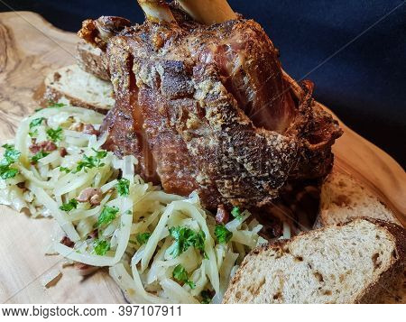 Pork Knuckle With White Cabbage And Bread