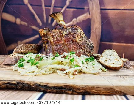Pork Knuckle With White Cabbage And Bread