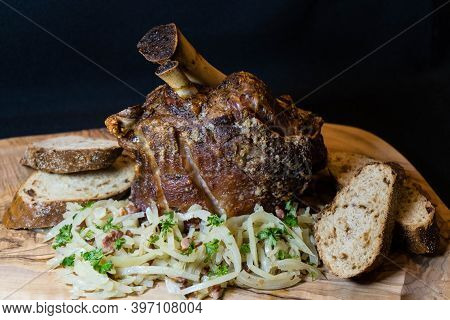 Pork Knuckle With White Cabbage And Bread