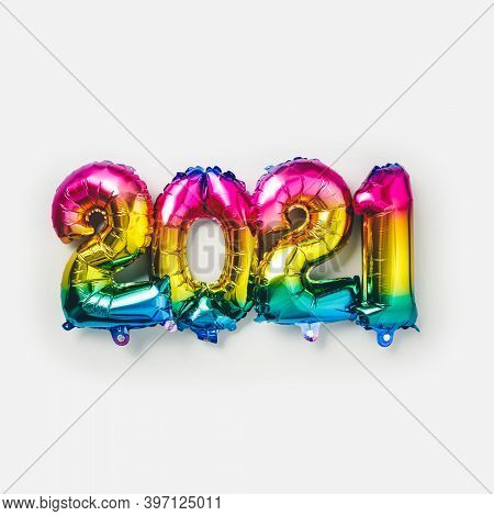 Rainbow Colored Foil Balloons In The Form Of Numbers 2021. New Year Celebration