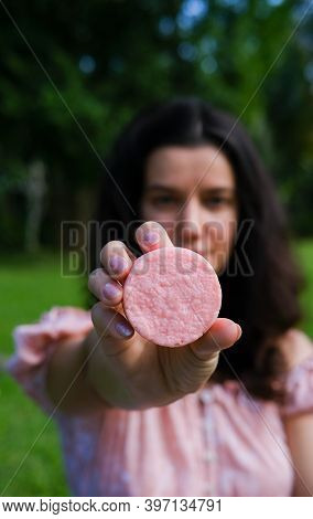Young Woman Holding Natural Eco Friendly Solid Shampoo Bar, Conditioner Or Soap. Zero Waste And Sust