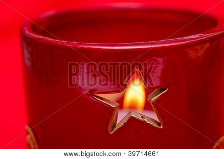 Estrela de um Candlestand com luz de vela