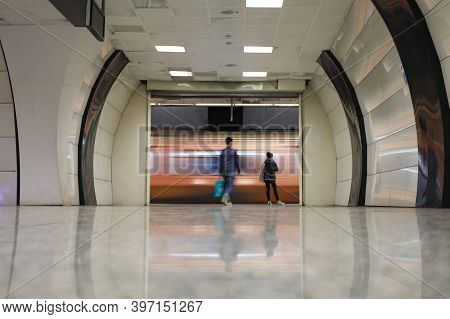 Motin Blured Metro Moving In A Station