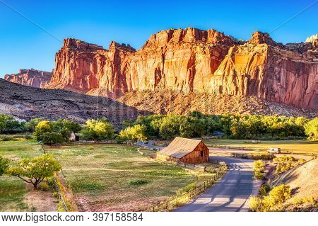 Landscape With Monumental Old Barn In Fruita At Sunset, Capitol Reef National Park, Utah, Usa