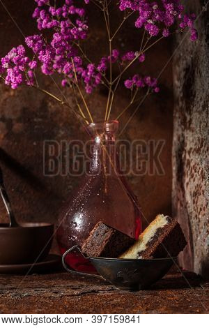 Flowers In A Glass Vase. Still Life Dark Photo