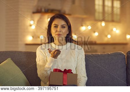 Young Pretty Woman Girlfiend Sending Air Kiss To Her Boyfriend Online During Date And Looking At Cam