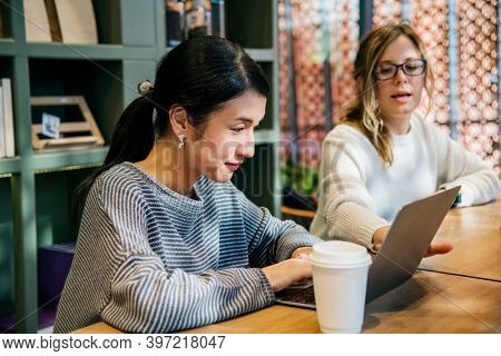 Japanese woman in a cafe with her friends